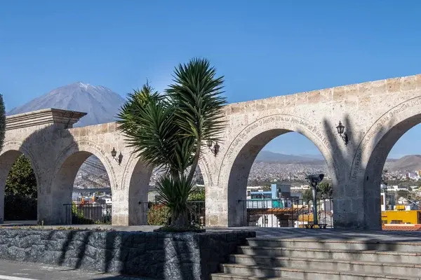 The Arches of Yanahuara Plaza and Misti Volcano on Background - written on the arches are quotes of famous