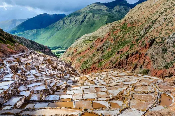 Landscape of salt terraces of Maras in Andes mountain range in the region of Cusco, Peru, Sacred Valley