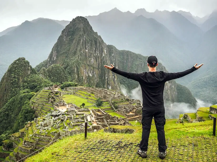Man stading in front of Machu Picchu - Inca Trail Difficulty and Preparation - Go Treks