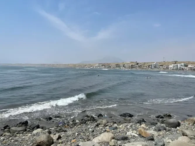 Beach with the sun at its peak during the summer in February.