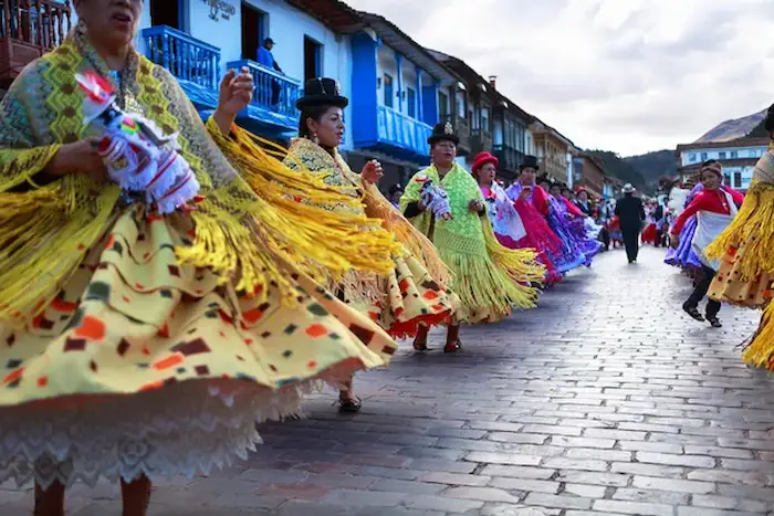 A group of women dancing during the carnivals in Peru.
